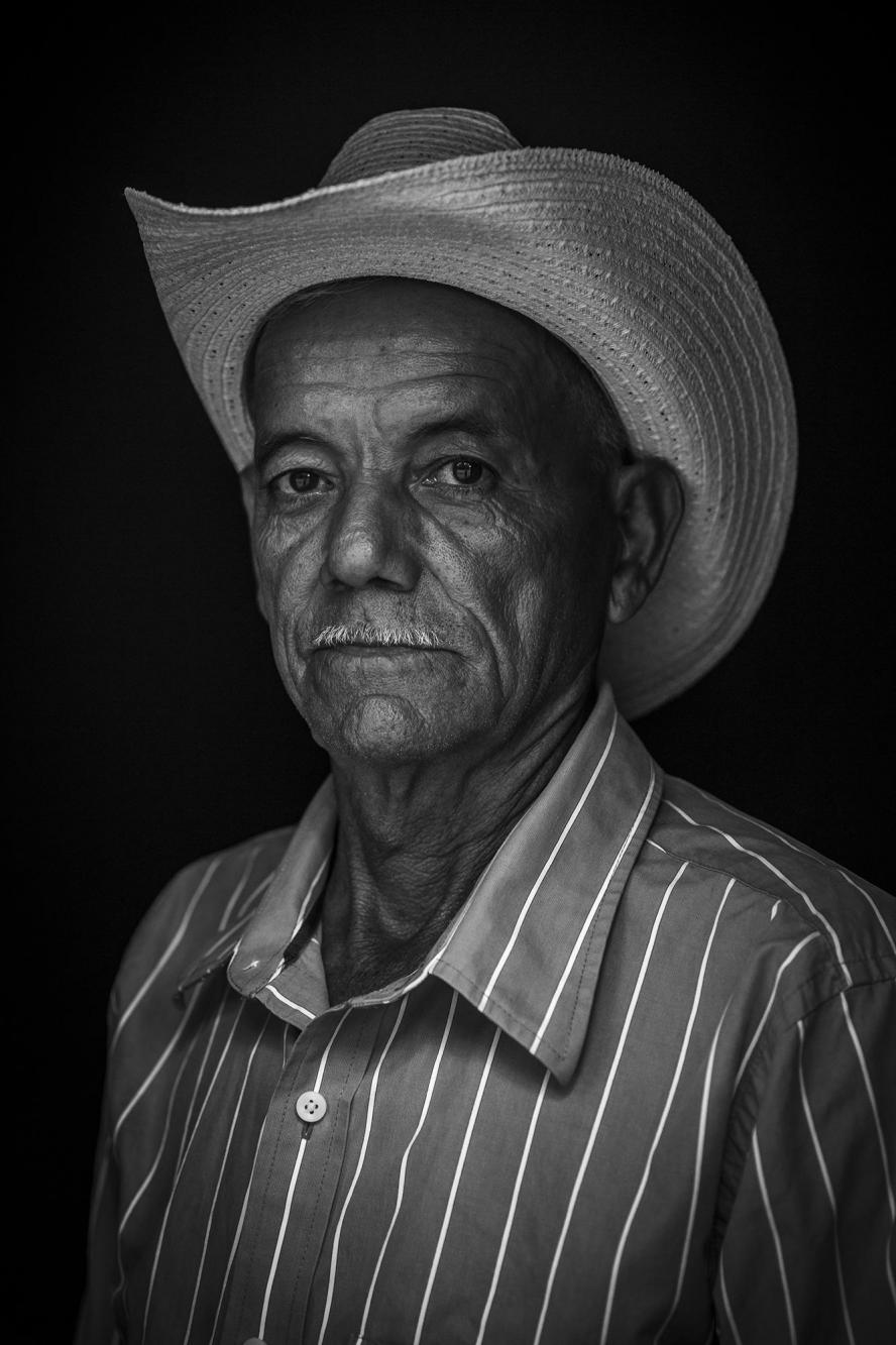 Francisco López was 32 years old when he crossed the Lempa River with his wife and two daughters. “There were some people who couldn't make it across. They couldn’t swim and some of them hung onto others and when they let go they sank down into the water and were never seen again. It was so terrible," says Francisco. "When the helicopter would pass by and barrage us with gunfire, people would dive under the water and some never came up." 
