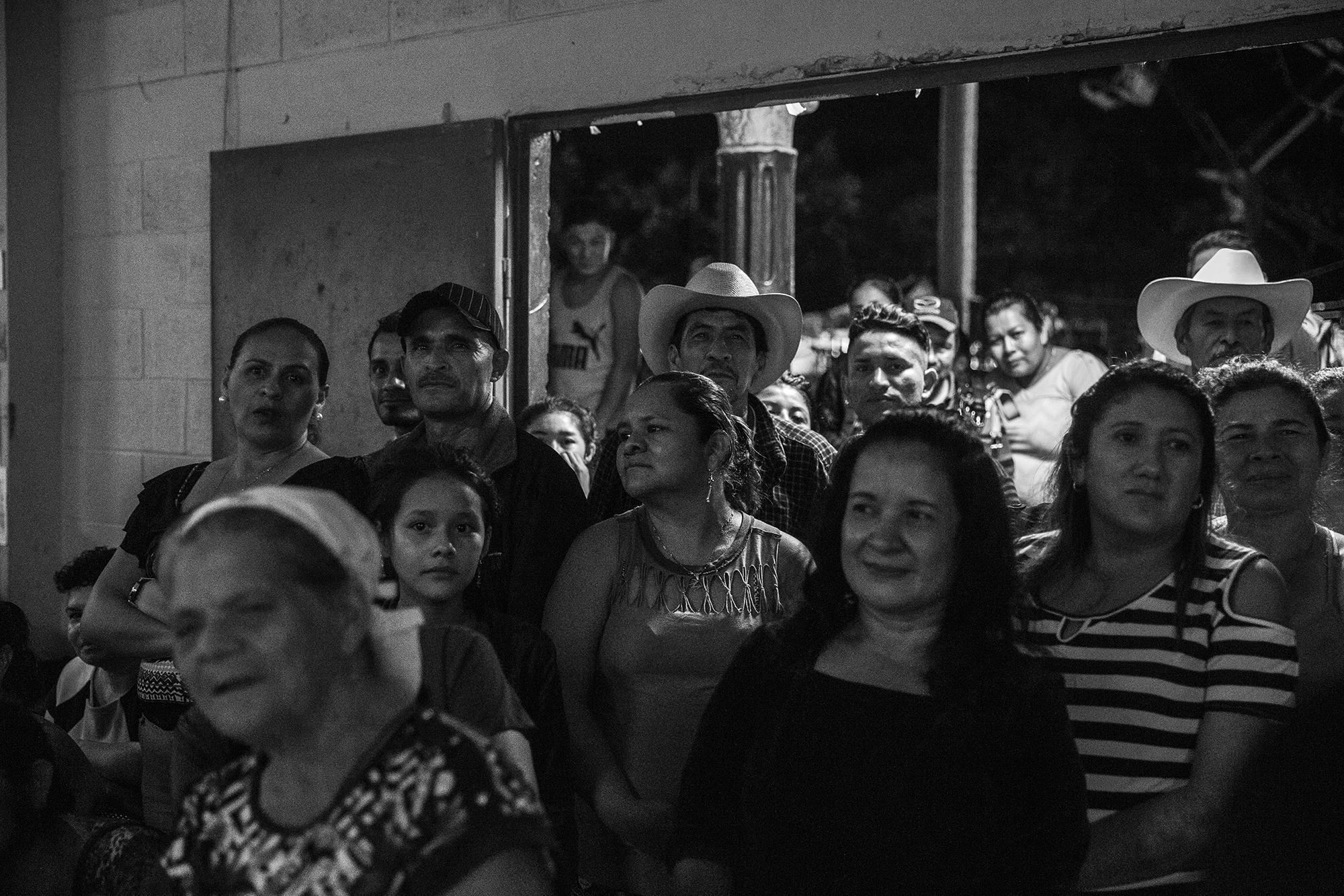 The generations of Santa Marta reunite. Children, adults, and the elderly enjoy the inaugural dance on the night of Oct. 9, 2019. The community organizes two celebrations. One is geared toward adults and features a band playing Los Tigres del Norte cover songs. The other is for the youth, who prefer more modern music, like reggaeton.