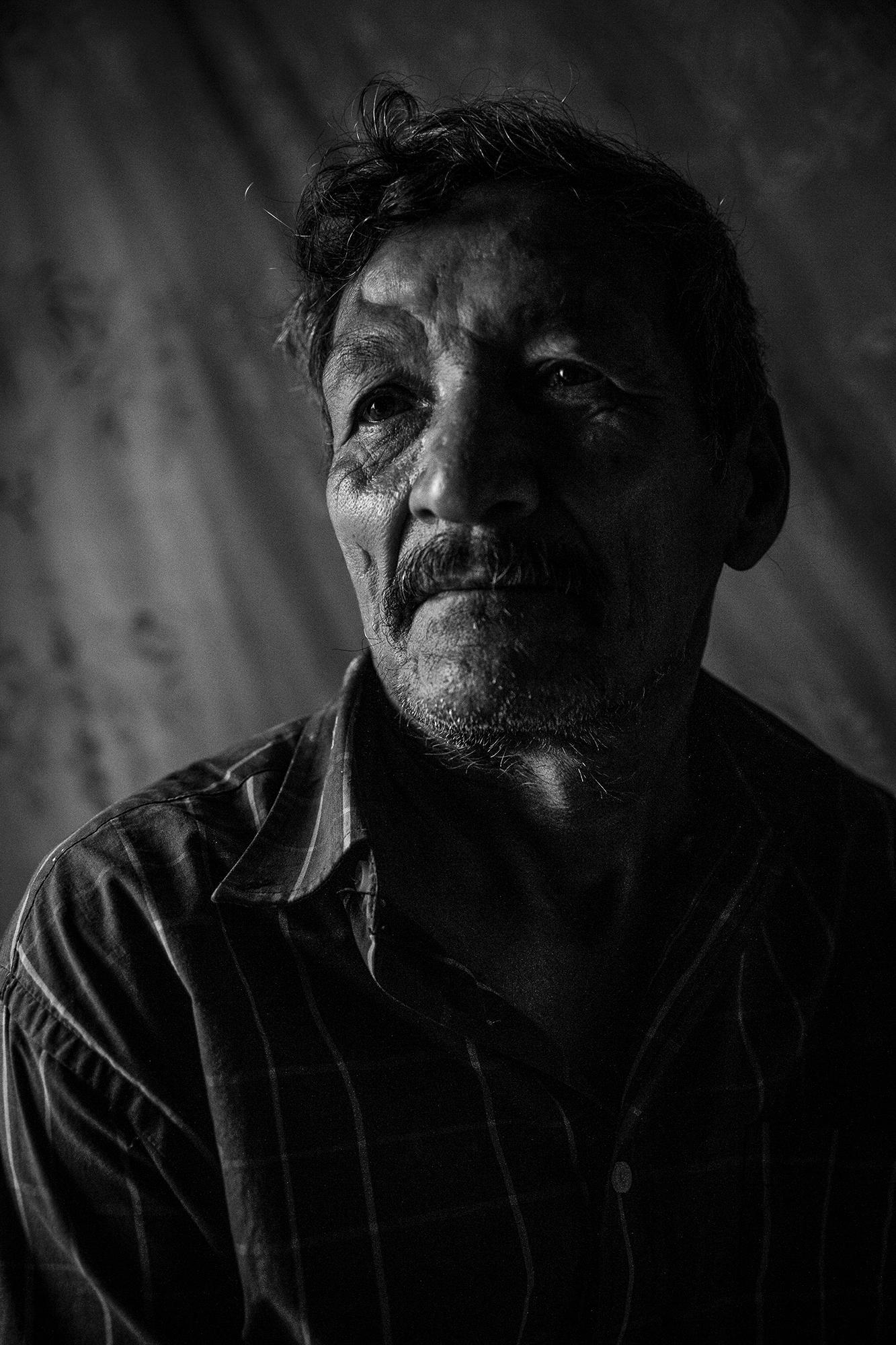 Gerardo Arturo Leiva was born on Sep. 10, 1954. By 1979, he was a member of the Unified Popular Action Front (Frente de Acción Popular Unificada, or FAPU) and later became a guerilla fighter in the ranks of the National Resistance (Resistencia Nacional, or RN). “At that time in ‘81, we had just a few guns, and we were fighting against the soldiers,” says Leiva. On the day of the massacre, he was helping people cross all day, as helicopters rained down gunfire from above.