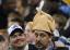 Un aficionado usa un sombrero con forma de pavo, durante el partido del jueves 26 de noviembre del 2009, Día de Acción de Gracias, entre los Packers de Green Bay y los Lions de Detroit  (AP foto/Carlos Osorio).