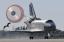 El transbordador Atlantis aterriza el el Centro Espacial Kennedy el viernes 27 de noviembre del 2009 en Cabo Cañaveral, Florida, después de una misión de once días a la estación espacial internacional (AP Foto/Bruce Weaver, Pool)