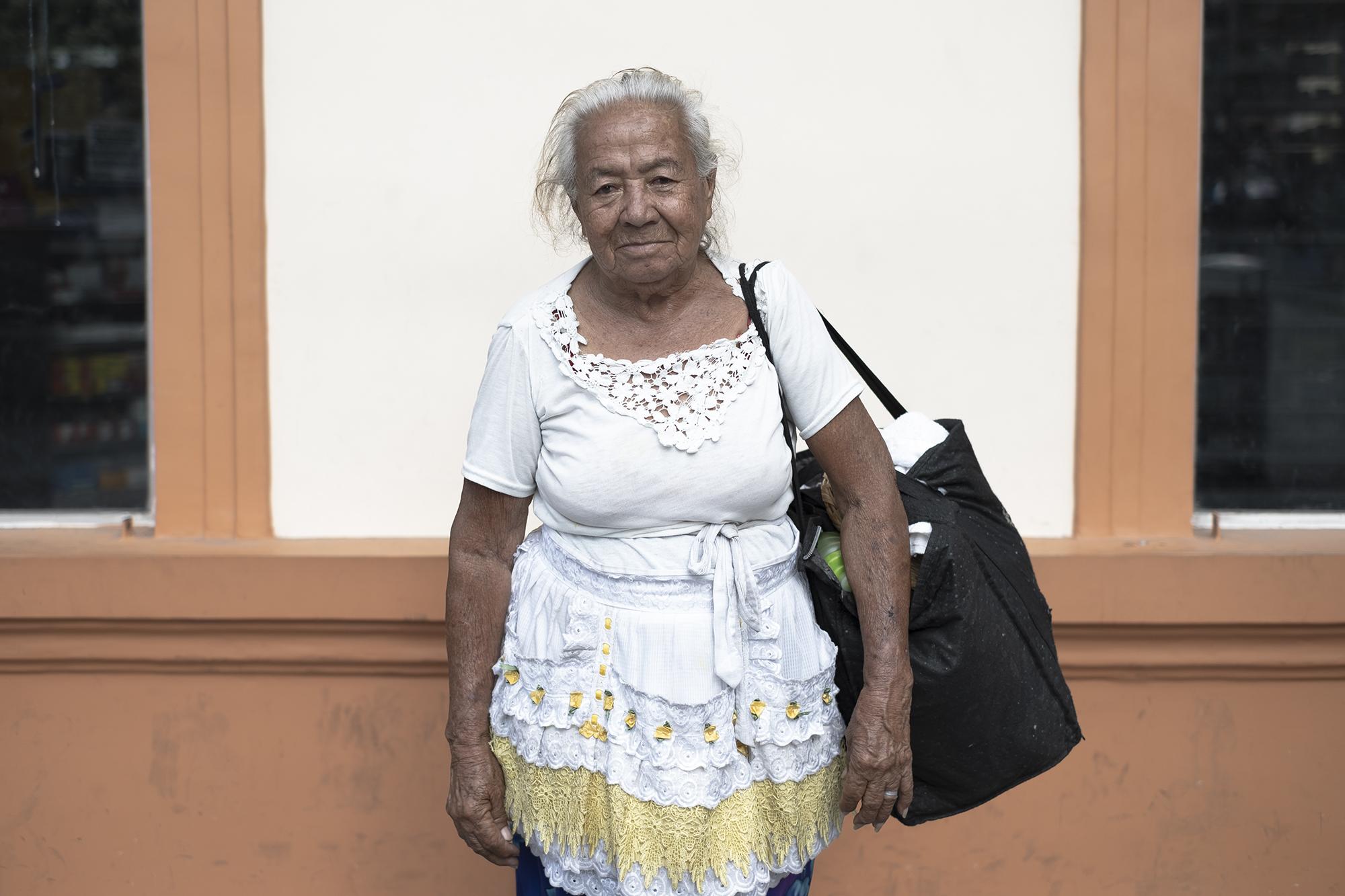Blanca Flamenco, 73, lives in Mariona and sells sewing supplies throughout downtown San Salvador. She makes about $5 every day, covering her basic needs. “I won’t stay home. I live alone because my children are dead and nobody can take care of me,” she said. “Let the people with money stay home. When you’re poor, you have to go to work.”